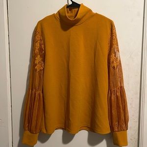 mustard turtle neck sheer arms
